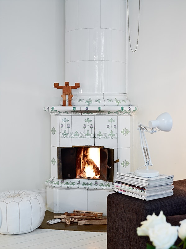 Cozy white home with a fireplace - via Coco Lapine Design