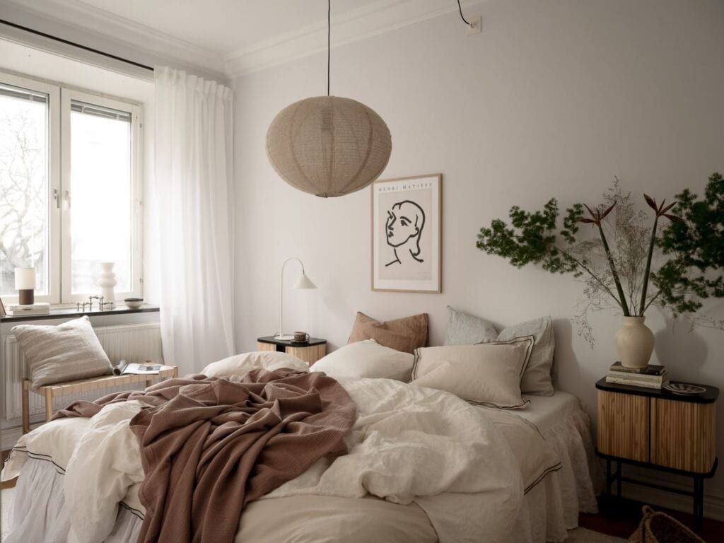 A bedroom with a natural color palette 