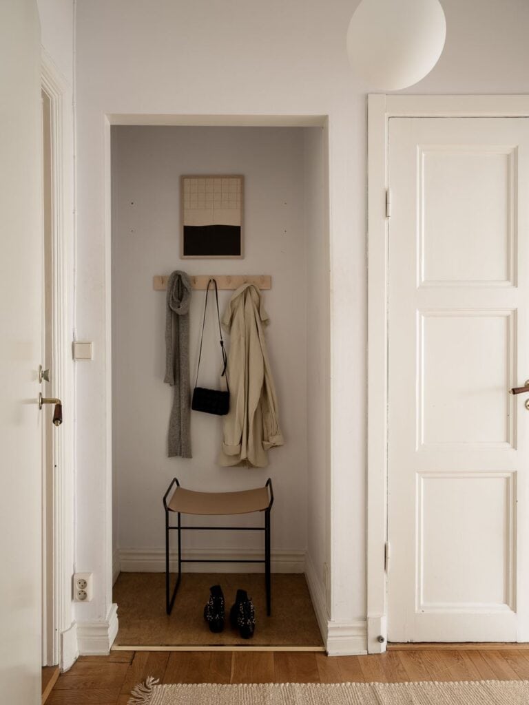 A entryway niche space with a wardrobe for hanging jackets