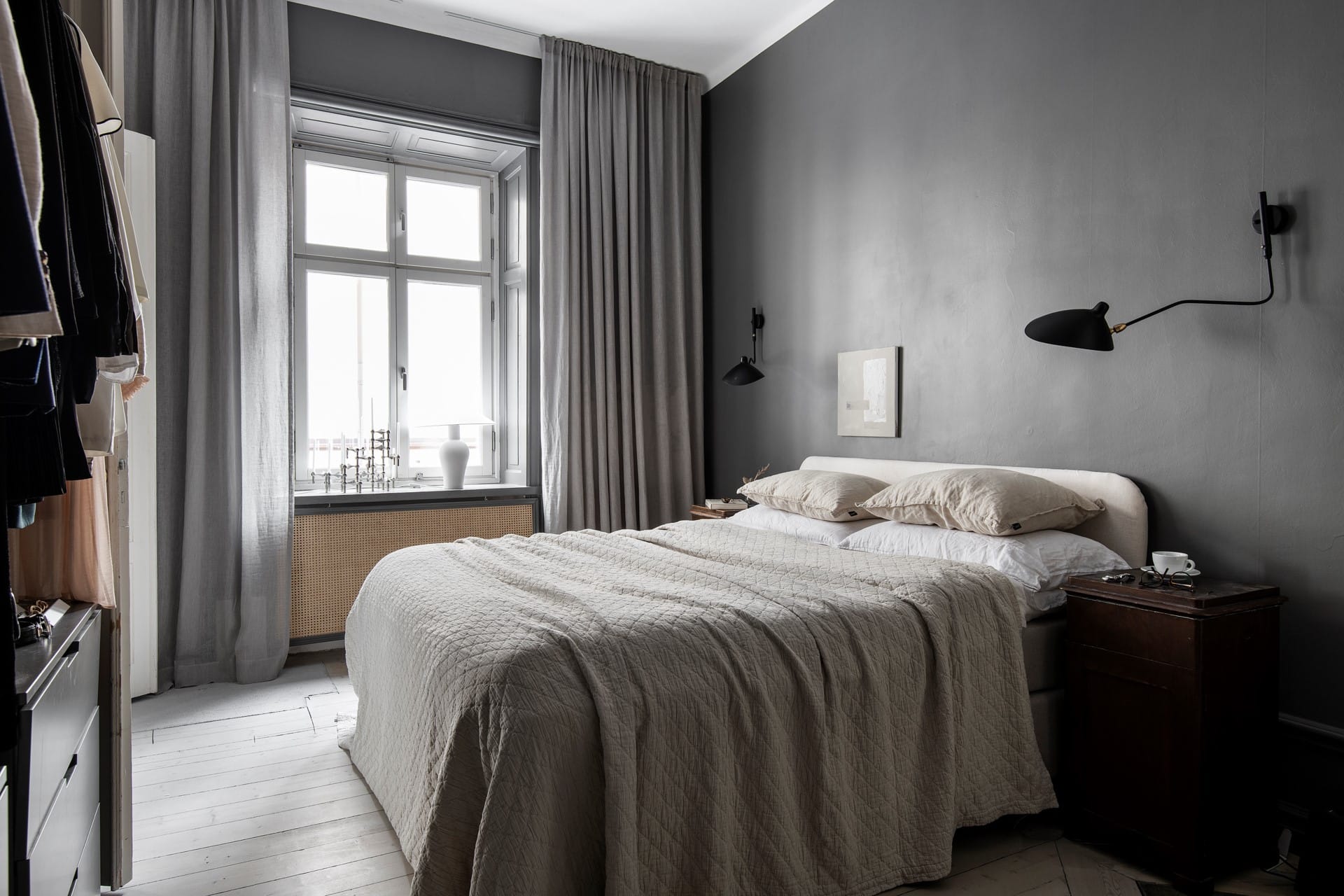 A mid-grey bedroom with warm elements