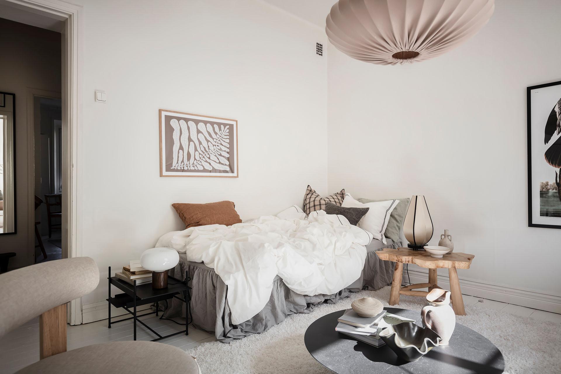 Home tour: White plank floors and white walls in a studio