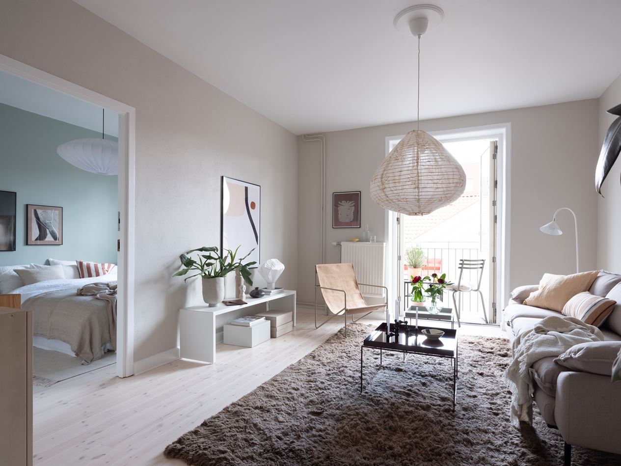 Sage green kitchen cabinets in a green color palette apartment - COCO  LAPINE DESIGNCOCO LAPINE DESIGN