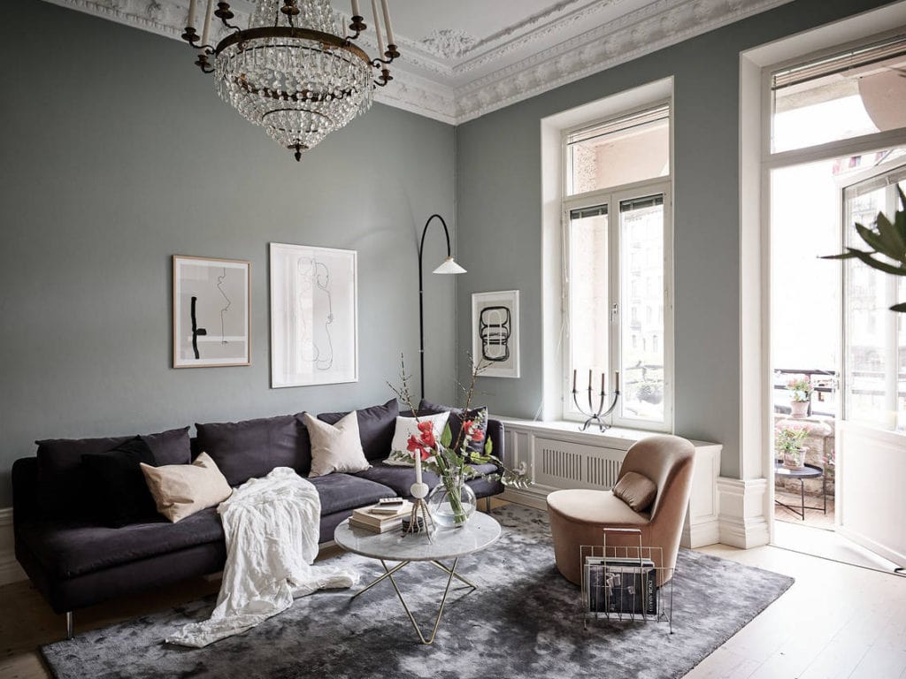 A black kitchen and blue bedroom walls in a historic Swedish apartment ...